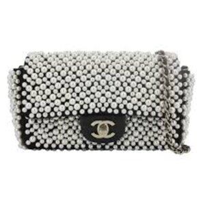 CHANEL Pearl Mini Flap 19s  - $12k